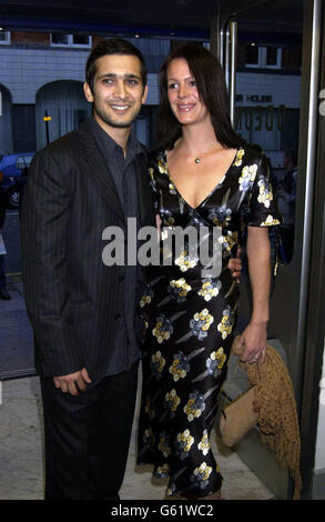 Actor Jimi Mistry arrives with wife Meg at the Odeon Covent Garden, London for the charity film premiere of 'My Kingdom'. Stock Photo