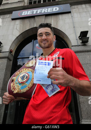 Welsh boxer Nathan Cleverly with his BetFred betting slip for £100 for Cardiff City to stay in the Premiership next season. Stock Photo