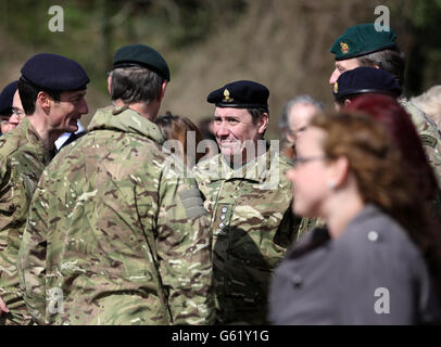 Musician Jools Holland (3rd left) in his role as Deputy Lord Lieutenant of Kent, talks to members of the Operation Herrick 17 Explosive Ordnance Disposal and Search Task Force, after they recieved their Afghanistan Campaign Medals at Invicta Park barracks in Maidstone, Kent, home to 36 Engineers Regiment (Search) which was the lead element in the task force. PRESS ASSOCIATION Photo. Picture date: Thursday April 18, 2013. Photo credit should read: Gareth Fuller/PA Wire Stock Photo