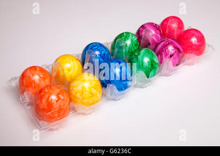 Plastic box with coloured Easter eggs Stock Photo