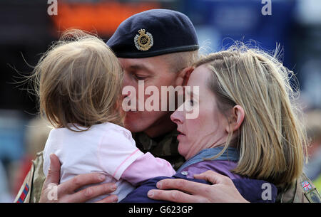 Troops from 21 Engineer Regiment are welcomed by their families in Ripon, North Yorkshire after returning home from Afghanistan. Stock Photo