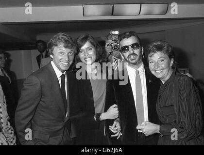 Guest of honour Tommy Steele (left) and his wife Ann (right), with former Beatles drummer Ringo Starr and his actress wife Barbara Bach at the Savoy Hotel, London. Ringo and Barbara were among the show business personalities at a tribute luncheon given by the Variety Club of Great Britain to mark Tommy's 25th year of West End stage stardom. Stock Photo