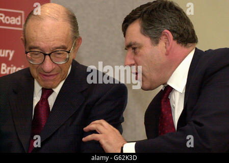 British Chancellor Gordon Brown talks with Doctor Alan Greenspan, left, Chairman of the United States Federal Reserve Board, who officially opened the new Treasury building in Whitehall. *...The modernised and refurbished open-space office accomodation will unite all Treasury staff in the same building for the first time in over 50 years. Stock Photo