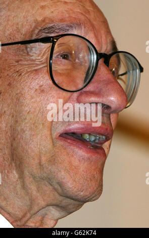 US Federal Reserve Chairman Alan Greenspan addresses an audience of business leaders in Lancaster House, London. In his speech Greenspan said governments should not regulate disclosure on the over the counter derivatives markets because it would stifle innovation and make markets less efficient. Stock Photo