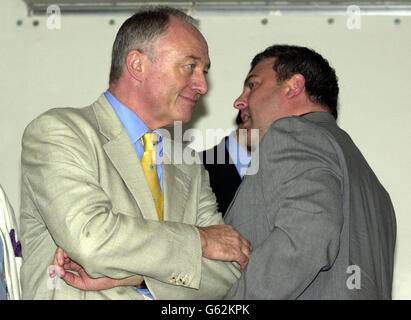 ASLEF General Secretary Mick Rix (right) speaks with Mayor of London Ken Livingstone during a rally in London's Hyde Park, following the Stop The War Coalition march against the proposed war on Iraq. Stock Photo