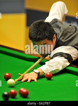 Snooker - Betfair World Championships - Day Five - The Crucible. Ding Junhui in action during his first round match against Alan McManus during the Betfair World Championships at the Crucible, Sheffield. Stock Photo