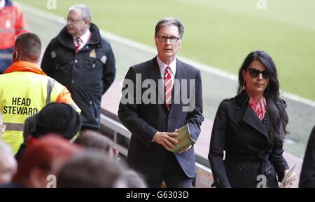 Liverpool Football Club owner, John Henry,(centre) arrives for the Hillsborough disaster memorial service, at Anfield, marking the 24th anniversary of the disaster, as they remember the 96 Liverpool supporters who died in a crush at Sheffield Wednesday's Hillsborough stadium on April 15 1989, where Liverpool were to meet Nottingham Forest in an FA Cup semi-final. Stock Photo