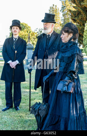 Costume Society members dressed in traditional mourning attire  at Mountain View Cemetery, Vancouver, British Columbia, Canada, Stock Photo