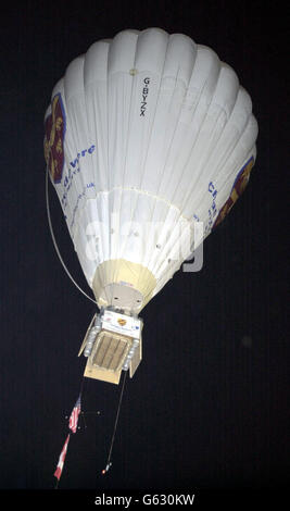 Explorer David Hempelman-Adams, 46, sets off from Allegheny County Airport, Pennsylvania, on his record-breaking attempt to cross the Atlantic in a balloon with an open wicker basket. * The adventurer from Wiltshire is hoping to beat the solo world distance record of 5,340 km (3,337.5 miles) for the helium and hot-air balloon type on the dangerous crossing. Stock Photo