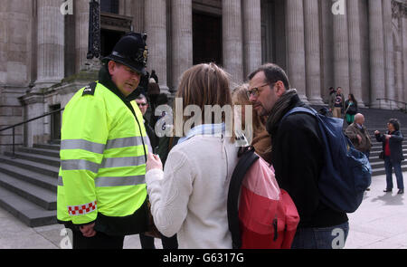 Police outside St Paul's Cathedral in London, as more than 4,000 police officers will be on duty tomorrow for Baroness Thatcher's funeral, Scotland Yard said today. Stock Photo