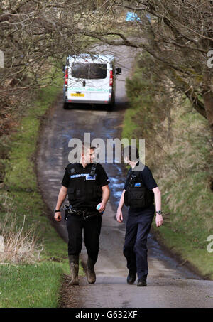 A private ambulance arrives in woodland above Bridge of Allan, Central Scotland, after police searching for a student missing since January, found a body in woodland yesterday. Stock Photo