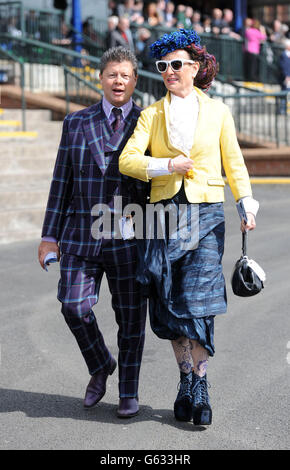 Racegoers arrive during day two of the 2013 Coral Scottish Grand National meeting at Ayr Racecourse, Ayr. Stock Photo