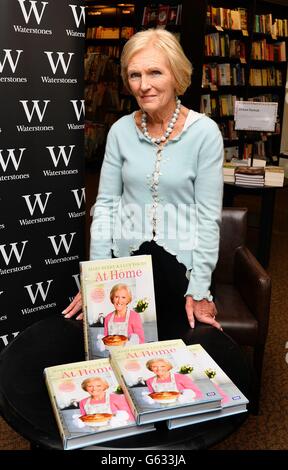 Mary Berry with copies of her book 'At Home', at a book signing session in a Waterstone's Book shop in Kensington, west London. Stock Photo