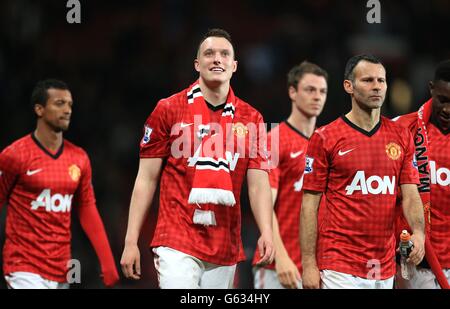 Soccer - Barclays Premier League - Manchester United v Aston Villa - Old Trafford. Manchester United Phil Jones celebrates clubs 20th league title at the final whistle Stock Photo