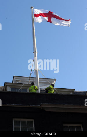 The flag of St George is raised over No.10 Downing Street in Central London Stock Photo