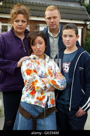 The Nelsons, the latest family to arrive on Coronation Street are unveiled on the set of the Granada soap in Manchester. From left to right; Mum Angela (Kathryn Hunt), dad Tommy (Thomas Craig), daughter Katy (Lucy-Jo Hudson) and son Craig (Richard Fleeshman). Stock Photo