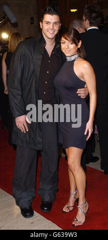 Pop star couple Lisa Scott Lee and Johnny Shentall arrive for the Pantene Pro-V Awards at the Royal Albert Hall in London. The awards, known as the 'Oscars' of the beauty industry recognise the talents of photographers, make-up artists, hairdressers, models and beauty journalists. Stock Photo