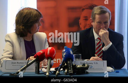 Taoiseach Enda Kenny and Minister for Social Protection Joan Burton launch an independent evaluation of JobBridge in LinkedIn's offices in Gardner House, Wilton Place. Stock Photo