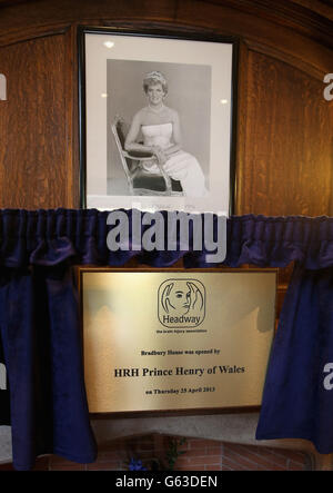 A plaque is unveiled underneath a picture of Diana, Princess of Wales during Prince Harry's visit to open the new headquarters of Headway, the brain injury charity in Nottingham. Stock Photo