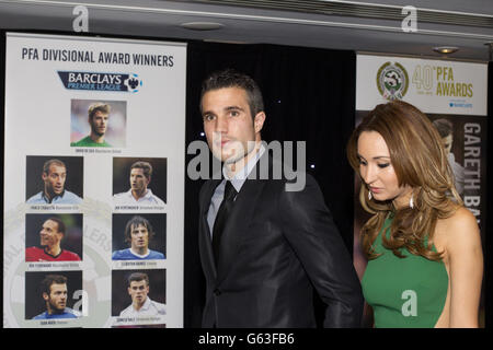 Manchester United's Robin van Persie and wife Bouchra Elbali during the PFA Player of the Year Awards 2013 at the Grosvenor House Hotel, London. Stock Photo