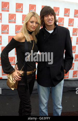 TV presenters Tess Daly and Vernon Kay arriving at the Old Saatchi Gallery in north London, for the Q Awards 2002. Stock Photo