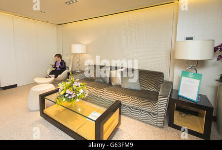 Paralympic swimmer Ellie Simmonds relaxes in The Haven Deluxe Owner's Suite on board Norwegian Cruise Line's new ship, the 146,600 tonne Norwegian Breakaway. Stock Photo