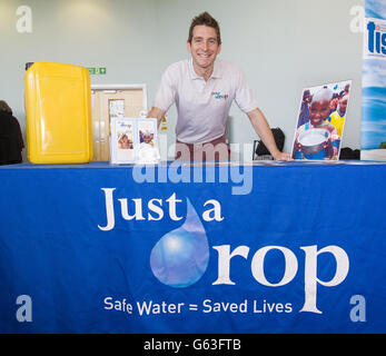 Chris Cook, Just a Drop charity School Ambassador and former Olympic swimmer at the City Cruise Terminal in Southampton before boarding Norwegian Cruise Line's new ship, the 146,600 tonne Norwegian Breakaway. Stock Photo