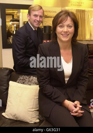 Belinda Earl, Chief Executive of the Debenhams store group, with Finance Director Matthew Roberts at their flagship shop in London's Oxford Street ahead of the release of their annual results. * which saw the company's profits rise to 153.6 million from last year's 146.1 million. The company, which currently operates 99 stores after recently opening branches in Basingstoke and Perth and will open a further three stores located in Redditch, East Kilbride and Inverness, wants to raise the number of outlets to 150 over the next ten years. 14/01/03 : Store group Debenhams said it saw good sales Stock Photo