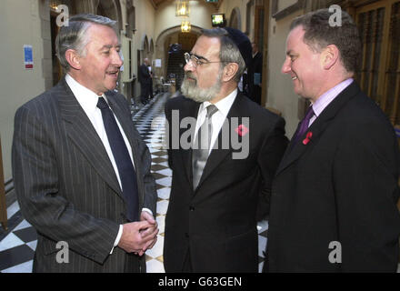 From left - The Scottish Parliament's Presiding Officer Sir David Steel chats with Chief Rabbi Jonathan Sacks and First Minister Jack McConnell at the Scottish Parliament, Edinburgh,as part of a visit to discuss how to tackle the problem of sectarianism in Scotland. Stock Photo