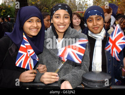 (L to R) Bushra Rahman15, Muktha Sikdar14 and Rahayla Kurshid 14 from Camden School for girls who had a photo taken with The Queen at the Memorial Gates on Constitution Hill, London which were officially Inaugurated by the Queen. * The memorial is to recognise the contribution and sacrifice made by Ethnic service men and women. Stock Photo