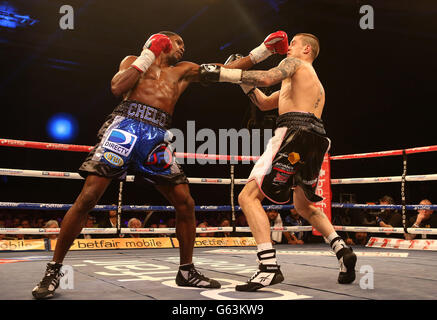 Ricky Burns (right) in action against Jose Gonzalez during the WBO Lightweight bout at the Emirates Arena, Glasgow. Stock Photo
