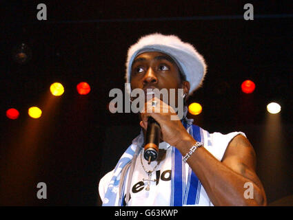 Simon Webbe from the pop band Blue performing on stage at Girlguiding UK Big Gig at Wembley Arena, West London. Stock Photo