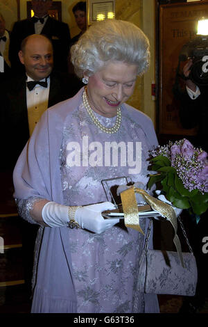 Britain's Queen Elizabeth II attends the 50th anniversary of the world's longest-running play, The Mousetrap, at St Martin's Theatre, London. *..Agatha Christie's famous whodunit , the first stage production to achieve a golden jubilee, opened on November 25, 1952, 10 months after the Queen came to the throne. Stock Photo