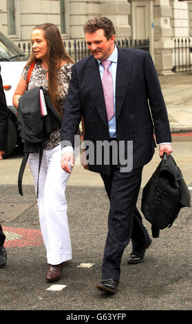 John Hardy, 43, who served as a Colour Sergeant at the Royal Military Training Academy at Sandhurst, and his 39-year-old wife, Claire Hardy arriving at Westminster Magistrates Court in central London where they are accused with conspiracy to commit misconduct in a public office between February 9 2006 and October 16 2008. Stock Photo
