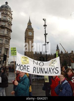 Placards at the demonstration in central London attended by celebrity chef Jamie Oliver with wife Jools and baby daughter Poppy against the expansion of Stansted airport in Essex. *... The cook, together with his family, marched with hundreds of protesters through London to demonstrate against airport expansion in the UK. Oliver criticised the Government which outlined proposals to cope with a massive demand in airport use over the next few decades. Adding an extra three runways at Stansted airport is just one of the options being considered. Stock Photo