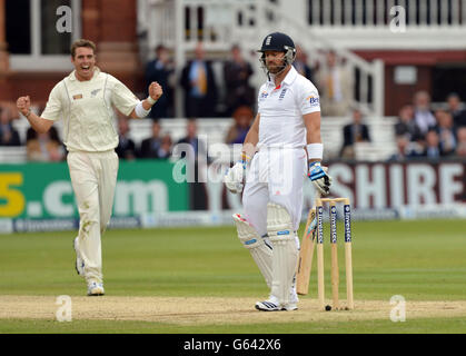 New Zealand's Tim Southee (left) taking the wicket of England's Matt Prior for 0 during the first test at Lord's Cricket Ground, London. Stock Photo