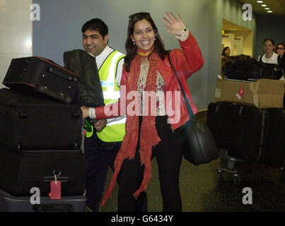 Miss India arriving at Gatwick Airport in London as she and the other Miss World contestants flew back from Nigeria after civil unrest in protest at the event being staged in Nigeria. Stock Photo