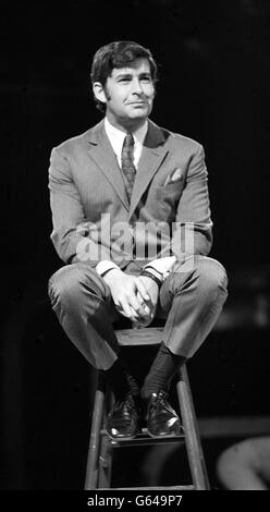 Comedian Dave Allen performs on stage. Stock Photo