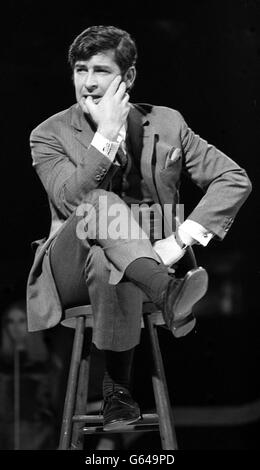 Comedian Dave Allen performs on stage. Stock Photo