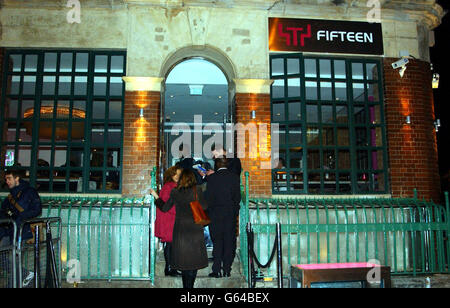 Guests arriving for the launch of Jamie Oliver's new restaurant 'Fifteen' in London's Old Street. The restaurant is staffed by professional cooks and also fifteen unemployed young people who are being given the opportunity to work in the kitchens of the restaurant. * as part of a training programme. All profits form the restuarant will go to Cheeky Chops, a charity set up by Jamie Oliver to support the additional training of current and future intake of students. Stock Photo