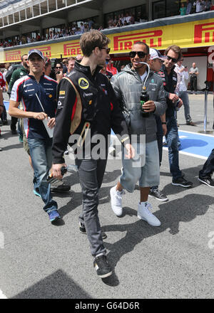 Auto - Formula One Motor Racing - Spanish Grand Prix - Race Day - Circuit de Catalunya. Lotus Romain Grosjean and Mercedes Lewis Hamilton during the Spainish Grand Prix at the Circuit de Catalunya, Barcelona, Spain. Stock Photo