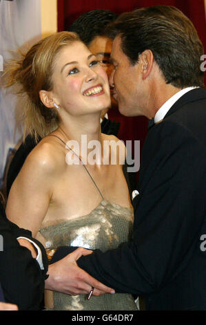 Pierce Brosnan who plays James Bond kisses co-star Rosamund Pike at the World Premiere of the latest Bond film 'Die Another Day' at London's Royal Albert Hall. Stock Photo