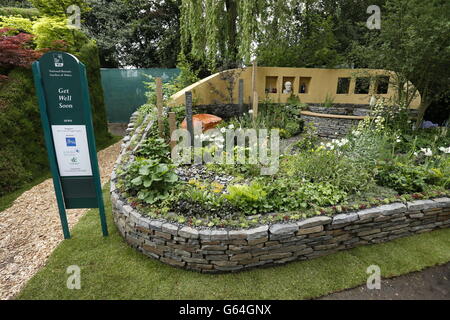 General view of the Get Well Soon Garden sponsored by the National Botanical Garden of Wales at the RHS Chelsea Flower Show, London. Stock Photo