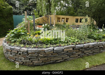 General view of the Get Well Soon Garden sponsored by the National Botanical Garden of Wales at the RHS Chelsea Flower Show, London. Stock Photo