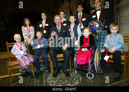 The Prince of Wales at the annual Women's Own Children of Courage Awards at Westminster Abbey with: * back row, from left to right, Rosy Simkiss, Karla Ingliss, Ben Vince, Khaleeq Khan, Marino Giorgetti; front row, Hayley Okines, Bradley Prescott, Colin Antink, Megan Reynolds, and Ben Clinton. Britain's bravest youngsters were honoured for their courage at the ceremony, attended by celebrity guests such as TV presenter Cat Deeley and ex-Take That singer Mark Owen. Ten children singled out for their remarkable actions and courageous stance on life received the awards at the event. Stock Photo