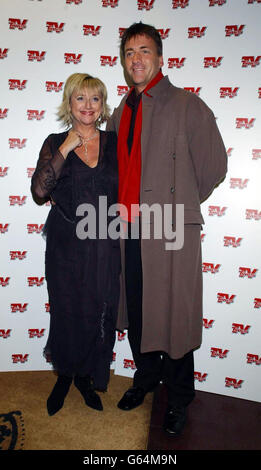 TV presenters Richard and Judy arriving for the TV Times Christmas Carols concert, at the Royal Albert Hall in London. Stock Photo