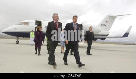 The Duke of York (right) is greeted by The Govenor of the Falkland Islands Donald La Mont, (front left) on his arrival at Mount Pleasant Airport. * The Duke will spend the next four days in the Falkland Islands to commemorate the 20th anniversary of the Falklands War, in which, Prince Andrew served as a Royal Navy helicopter pilot. Stock Photo