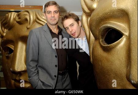 Director and star of the film George Clooney (left), with actor Sam Rockwell, also starring in the film prior to a special BAFTA screening of their new movie 'Confessions of a Dangerous Mind', at BAFTA Piccadilly in central London. Stock Photo