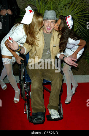 US singer Justin Timberlake arrives in a wheelchair with a broken leg at the Billboard Music Awards at the MGM Grand Hotel in Las Vegas. * The awards, in it's 14th year, recognises the artists and the songs that have climbed to the top of the American charts throughout the year. Stock Photo