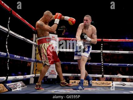 Tony Bellew (right) in action with Isaac Chilemba during their WBC Silver Light Heavyweight Championship and World Final Eliminator at the O2 Arena, London. Stock Photo